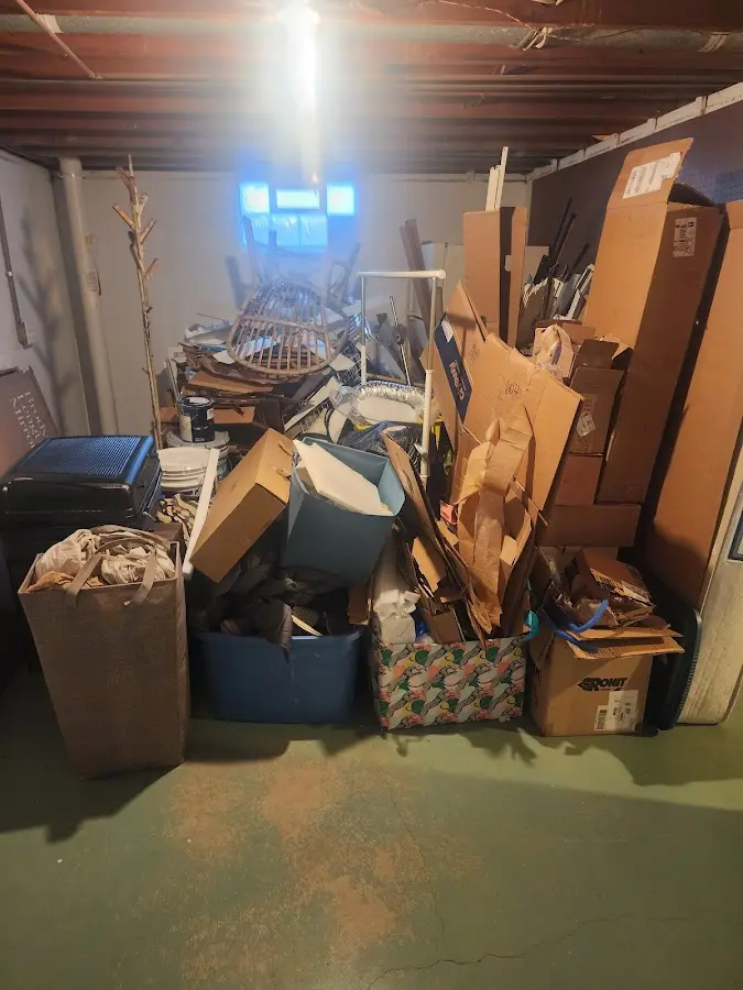 Roll-off dumpster container at job site for 2 Yard Dumpster Rental in Sebastian